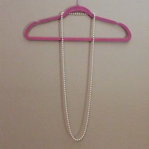 Long faux pearl necklace
